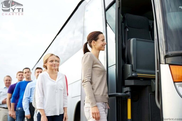 A modern shuttle bus rental parked in a city setting, featuring spacious seating